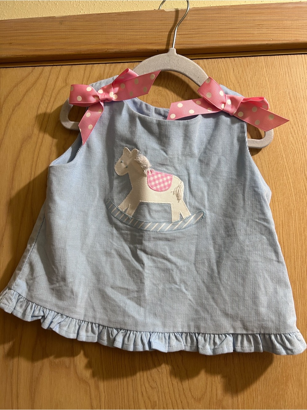 Blue Girls' Sleeveless Dress with Pink Ribbon Accents